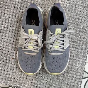 On Running Gray and Yellow Sneakers